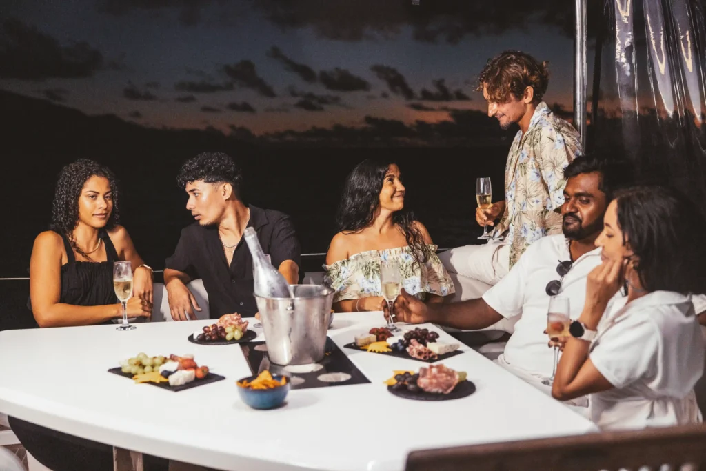 friends-dining-on-yacht-during-sunset-cruise-2